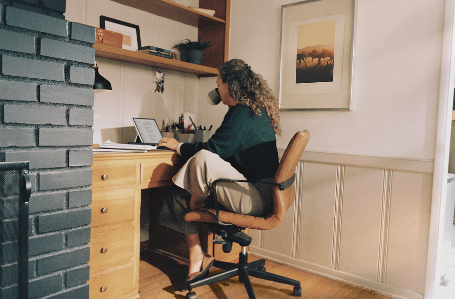 woman working on laptop at home
